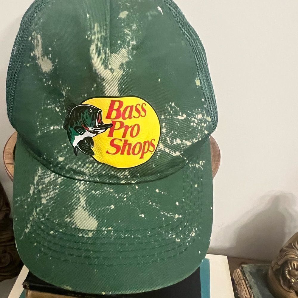 Distressed youth Bass Pro Shops customized trucker SnapBack.